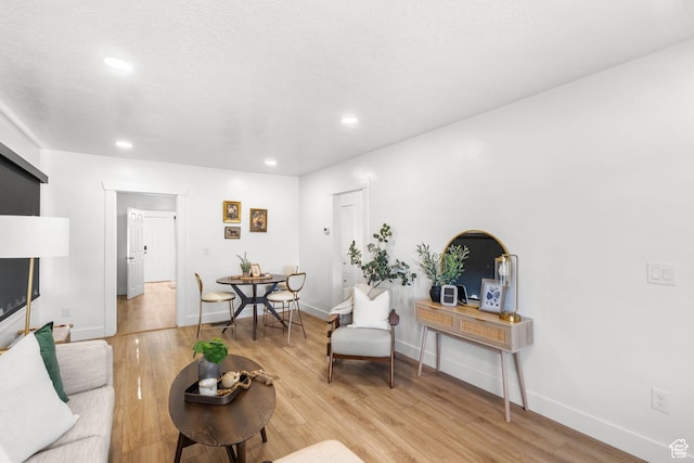 1022 27th St S, Ogden, UT 84403 - living area with light wood-style floors, recessed lighting, and baseboards