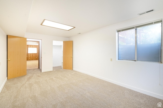 649 W Bulldog Cir, Murray, UT 84123 - unfurnished bedroom with light carpet, baseboards, and a spacious closet