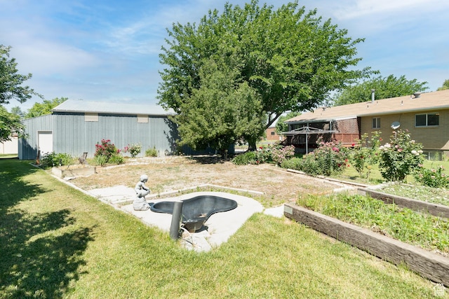649 W Bulldog Cir, Murray, UT 84123 - view of green lawn featuring an outbuilding, a garden, and an outdoor structure