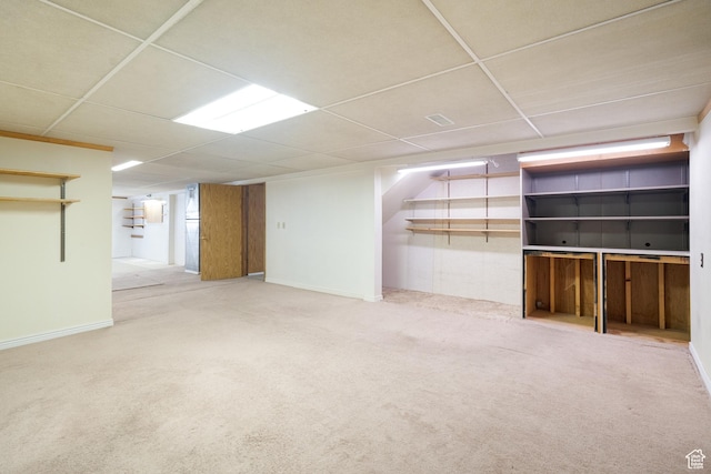 649 W Bulldog Cir, Murray, UT 84123 - finished below grade area with a paneled ceiling, carpet flooring, and baseboards