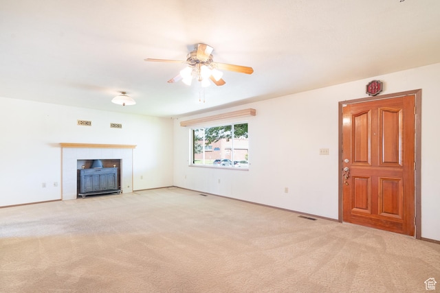 649 W Bulldog Cir, Murray, UT 84123 - unfurnished living room with a ceiling fan, carpet floors, and baseboards