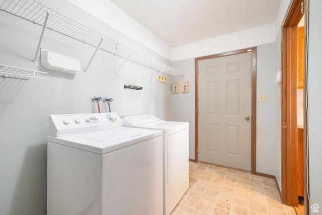649 W Bulldog Cir, Murray, UT 84123 - washroom featuring washer and clothes dryer and baseboards