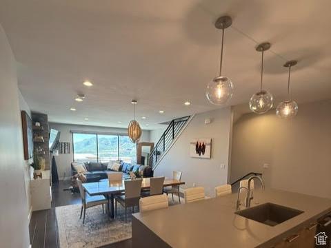 795 E Miner Way, Hideout, UT 84036 - kitchen with a sink, open floor plan, dark wood-style flooring, hanging light fixtures, and recessed lighting