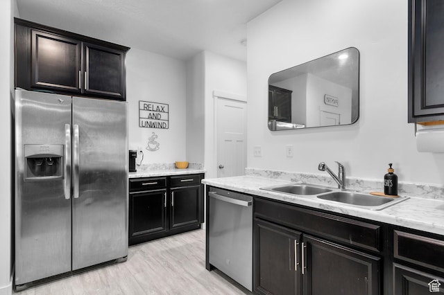 347 N 750 E, Vineyard, UT 84059 - kitchen with stainless steel appliances, a sink, and light wood-style flooring
