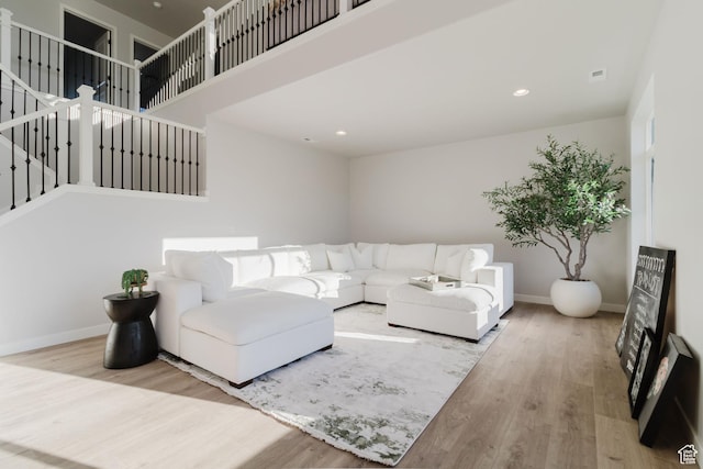903 S 250 W, American Fork, UT 84003 - living room with wood finished floors, recessed lighting, and a towering ceiling
