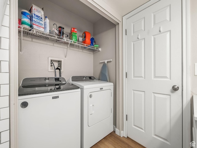 150 S 800 E Unit G2, Salt Lake City, UT 84102 - washroom featuring washer and dryer and light wood-style flooring