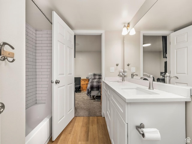 150 S 800 E Unit G2, Salt Lake City, UT 84102 - bathroom with double vanity, wood finished floors, connected bathroom, and tub / shower combination