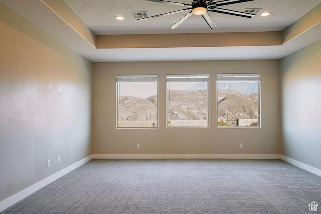 579 N Staci Dr, Hurricane, UT 84737 - spare room with carpet flooring, recessed lighting, ceiling fan, and a raised ceiling