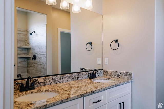 579 N Staci Dr, Hurricane, UT 84737 - full bathroom featuring double vanity and tiled shower