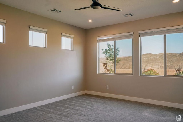 579 N Staci Dr, Hurricane, UT 84737 - carpeted spare room featuring ceiling fan, recessed lighting, and a mountain view