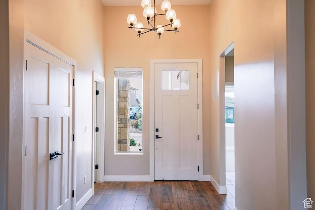 579 N Staci Dr, Hurricane, UT 84737 - entryway with a towering ceiling, a chandelier, and hardwood / wood-style floors