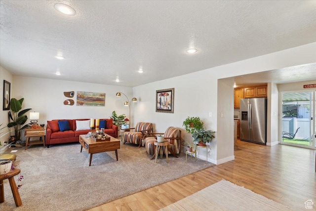 846 E 5600 S, South Ogden, UT 84405 - living room with a textured ceiling, light wood-type flooring, and recessed lighting