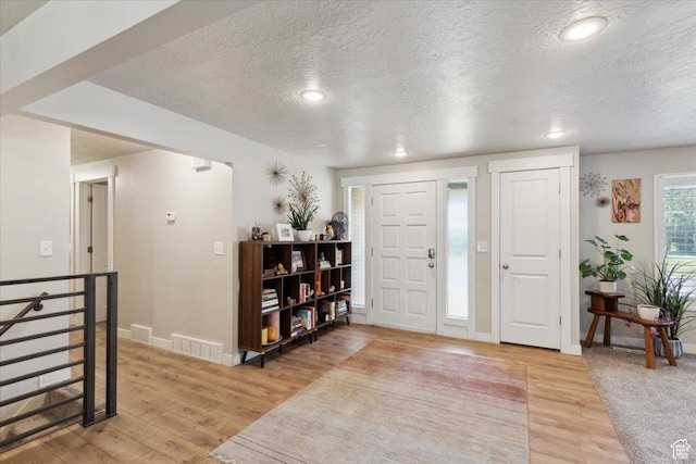846 E 5600 S, South Ogden, UT 84405 - foyer featuring a textured ceiling, light wood-type flooring, and recessed lighting