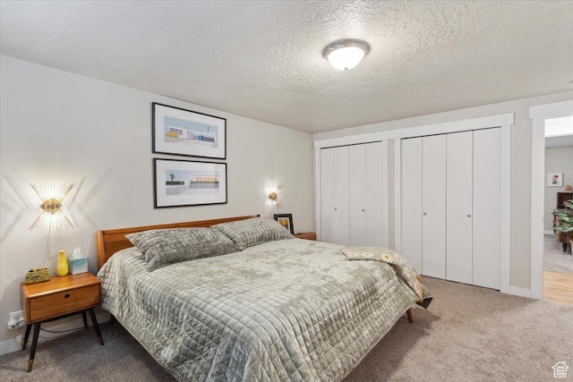 846 E 5600 S, South Ogden, UT 84405 - carpeted bedroom with multiple closets and a textured ceiling
