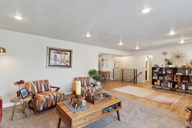 846 E 5600 S, South Ogden, UT 84405 - living room featuring a textured ceiling, recessed lighting, and wood finished floors