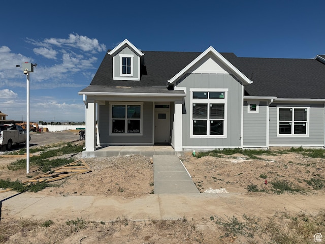 28 S 3830 W Unit 424, West Point, UT 84015 - view of front of house with board and batten siding and covered porch