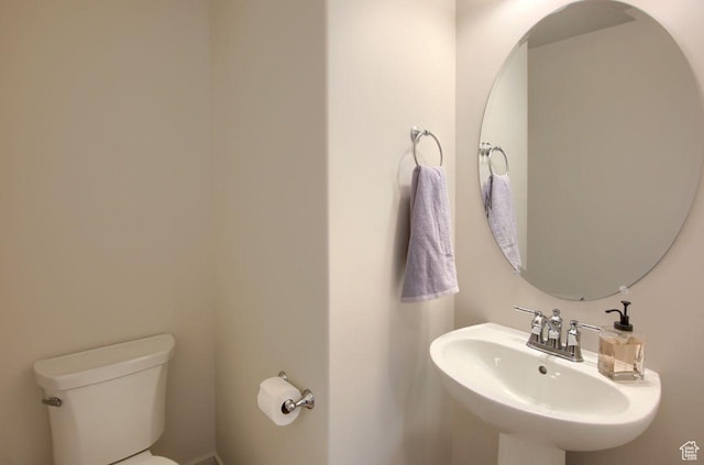 1677 S Haven Pkwy, West Haven, UT 84401 - half bathroom with a sink and toilet