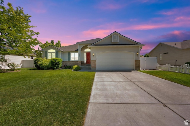 7443 W Perennial Dr, Magna, UT 84044 - ranch-style home with an attached garage, concrete driveway, and brick siding