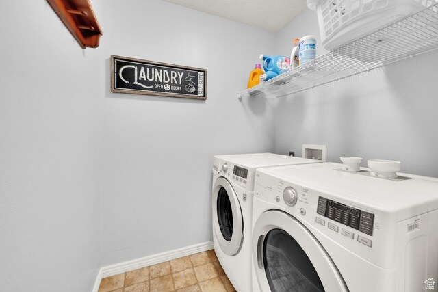 7443 W Perennial Dr, Magna, UT 84044 - washroom with baseboards and washing machine and clothes dryer