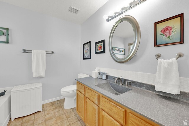 7443 W Perennial Dr, Magna, UT 84044 - bathroom with vanity, radiator, and a tub