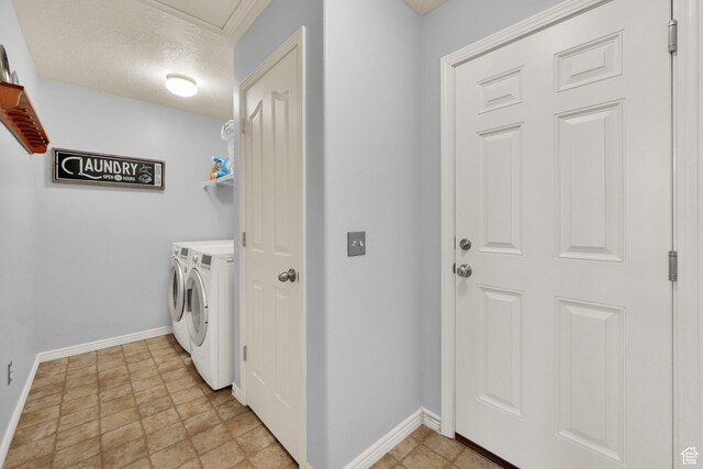 7443 W Perennial Dr, Magna, UT 84044 - laundry area featuring washer and clothes dryer and a textured ceiling