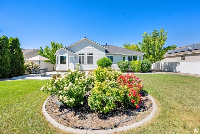7443 W Perennial Dr, Magna, UT 84044 - ranch-style home featuring a patio area