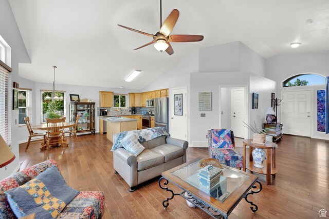 7443 W Perennial Dr, Magna, UT 84044 - living area with ceiling fan, healthy amount of natural light, light wood-style flooring, and high vaulted ceiling