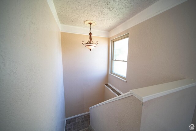 617 Aspen Cir, Price, UT 84501 - stairs featuring a textured ceiling and a textured wall