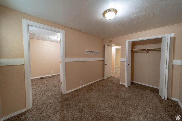 617 Aspen Cir, Price, UT 84501 - unfurnished bedroom featuring carpet and a closet