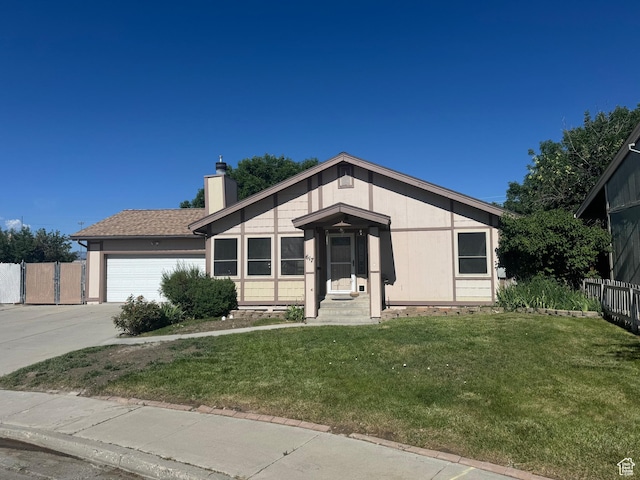 617 Aspen Cir, Price, UT 84501 - single story home with a chimney, concrete driveway, and an attached garage