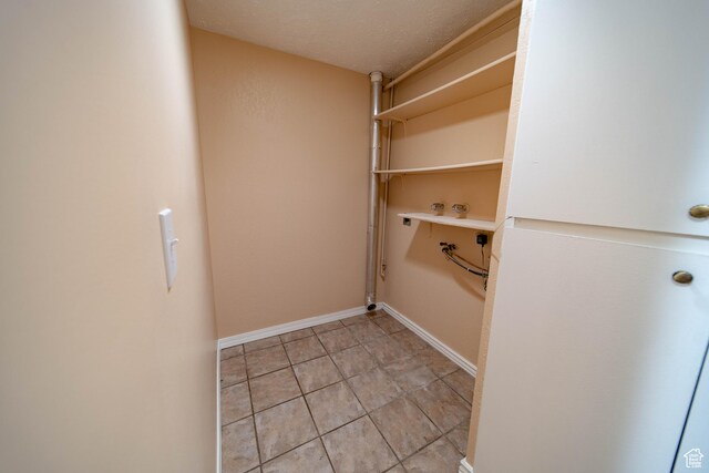 617 Aspen Cir, Price, UT 84501 - walk in closet featuring light tile patterned floors