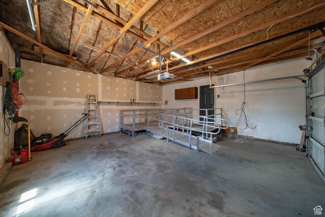 617 Aspen Cir, Price, UT 84501 - garage featuring a garage door opener