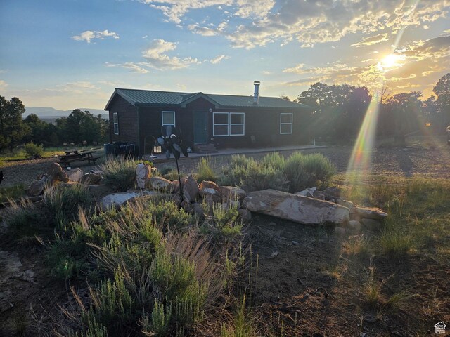 6430 S 37280 W Unit 40, Fruitland, UT 84027 - back of house with a metal roof
