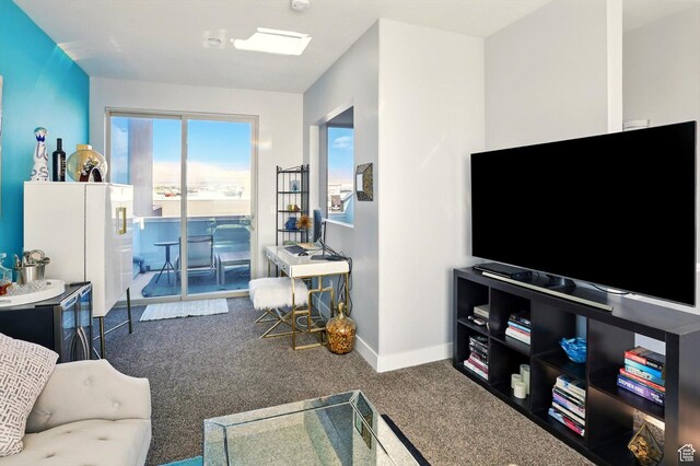 4746 W Daybreak Rim Way S, Jordan, UT 84009 - living area with carpet and baseboards