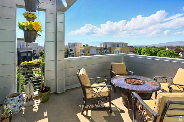 4746 W Daybreak Rim Way S, Jordan, UT 84009 - balcony with a fire pit