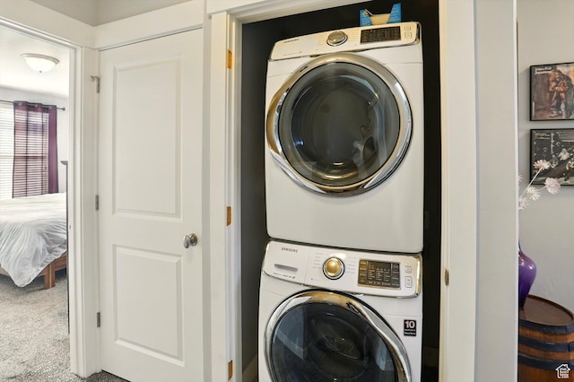 4746 W Daybreak Rim Way S, Jordan, UT 84009 - laundry room with stacked washer / dryer and carpet floors