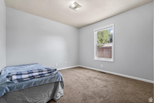1866 E Village Rd S, Salt Lake City, UT 84121 - carpeted bedroom with baseboards