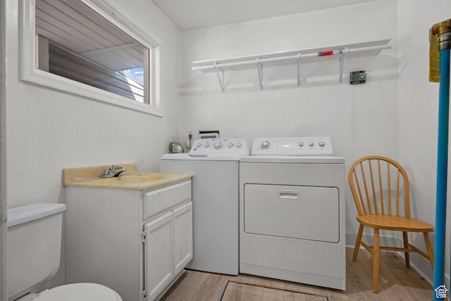 1866 E Village Rd S, Salt Lake City, UT 84121 - laundry room featuring washing machine and clothes dryer and light wood-style floors