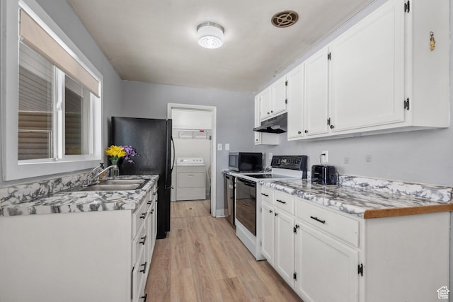 1866 E Village Rd S, Salt Lake City, UT 84121 - kitchen with range with electric cooktop, under cabinet range hood, washer / dryer, and white cabinetry