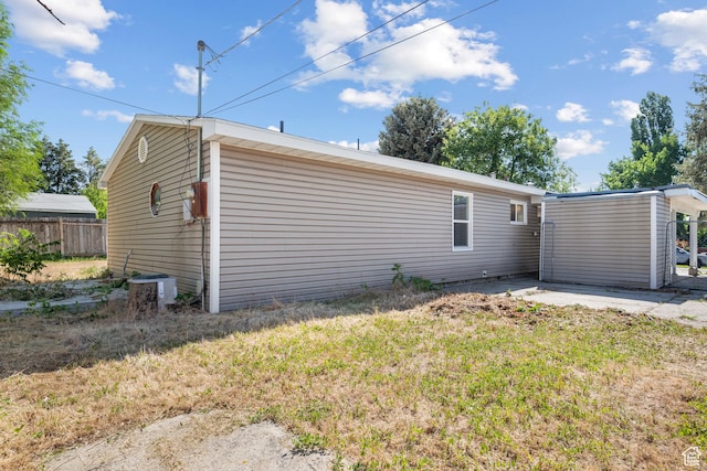 1866 E Village Rd S, Salt Lake City, UT 84121 - rear view of house featuring a patio area