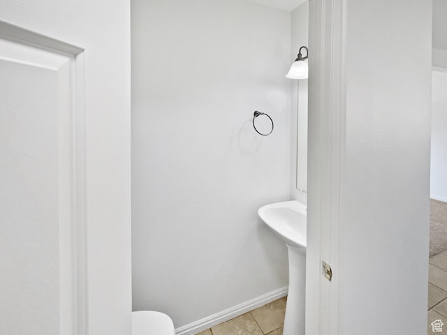 2238 N Harvest Moon Dr, Saratoga Springs, UT 84045 - half bathroom with tile patterned floors and baseboards