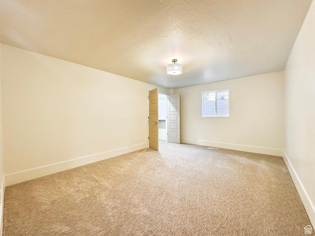 5862 S Ayrshire Dr, Murray, UT 84107 - empty room with light carpet and a textured ceiling
