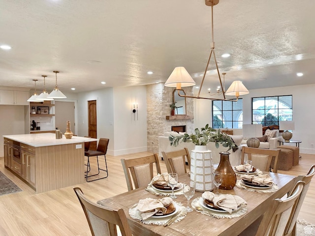 5862 S Ayrshire Dr, Murray, UT 84107 - dining space with recessed lighting, light wood finished floors, and a chandelier