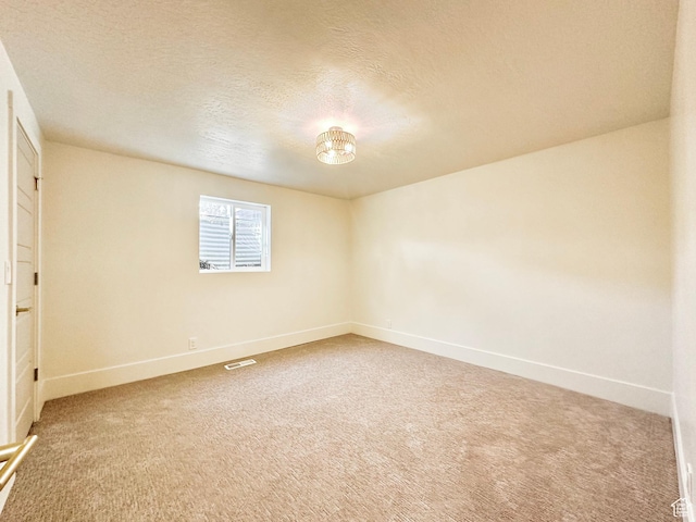 5862 S Ayrshire Dr, Murray, UT 84107 - carpeted empty room featuring baseboards and a textured ceiling