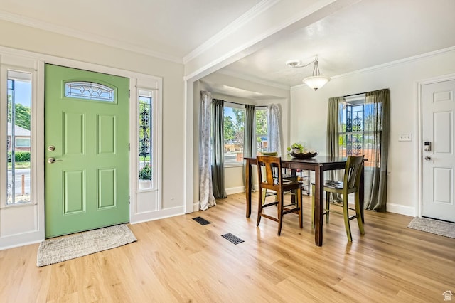 293 E 4800 S, Murray, UT 84107 - foyer with light wood-style flooring, plenty of natural light, and ornamental molding