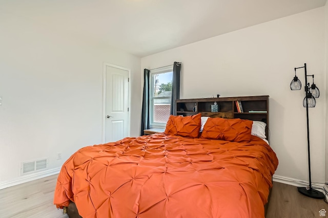 293 E 4800 S, Murray, UT 84107 - bedroom featuring wood finished floors and baseboards