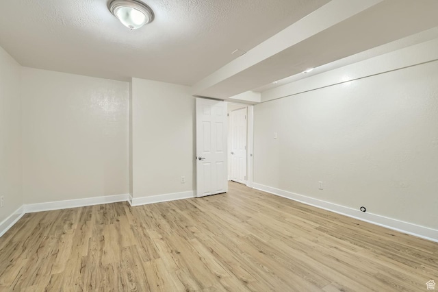 293 E 4800 S, Murray, UT 84107 - finished below grade area featuring light wood-style floors and baseboards
