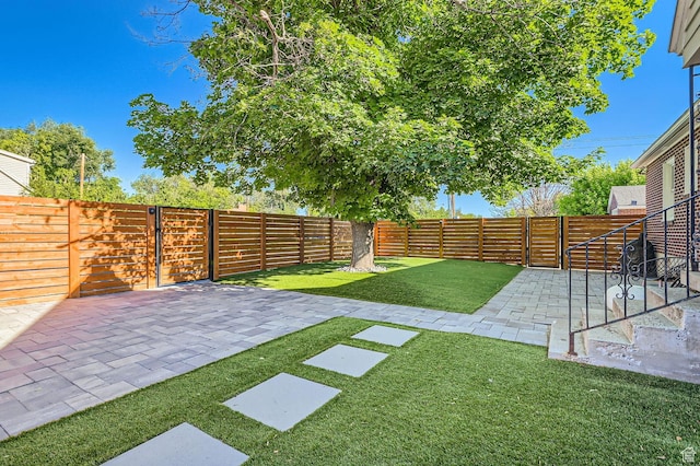 293 E 4800 S, Murray, UT 84107 - fenced backyard featuring a patio area