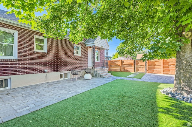 293 E 4800 S, Murray, UT 84107 - view of yard with a patio area