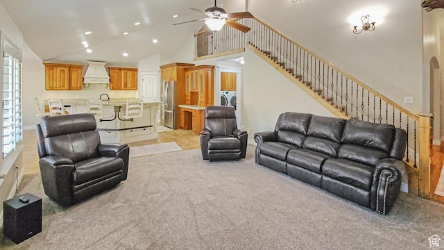1812 E 1460 S, Spanish Fork, UT 84660 - living room with light carpet, high vaulted ceiling, washer and clothes dryer, ceiling fan, and recessed lighting
